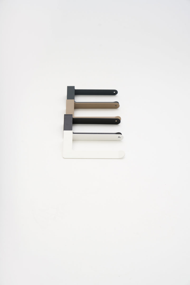 A set of powder coated ATYP steel pieces built to stay, studio flat lay