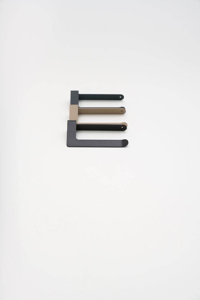 The five ATYP powder coat finishes shown together on steel pieces in the studio