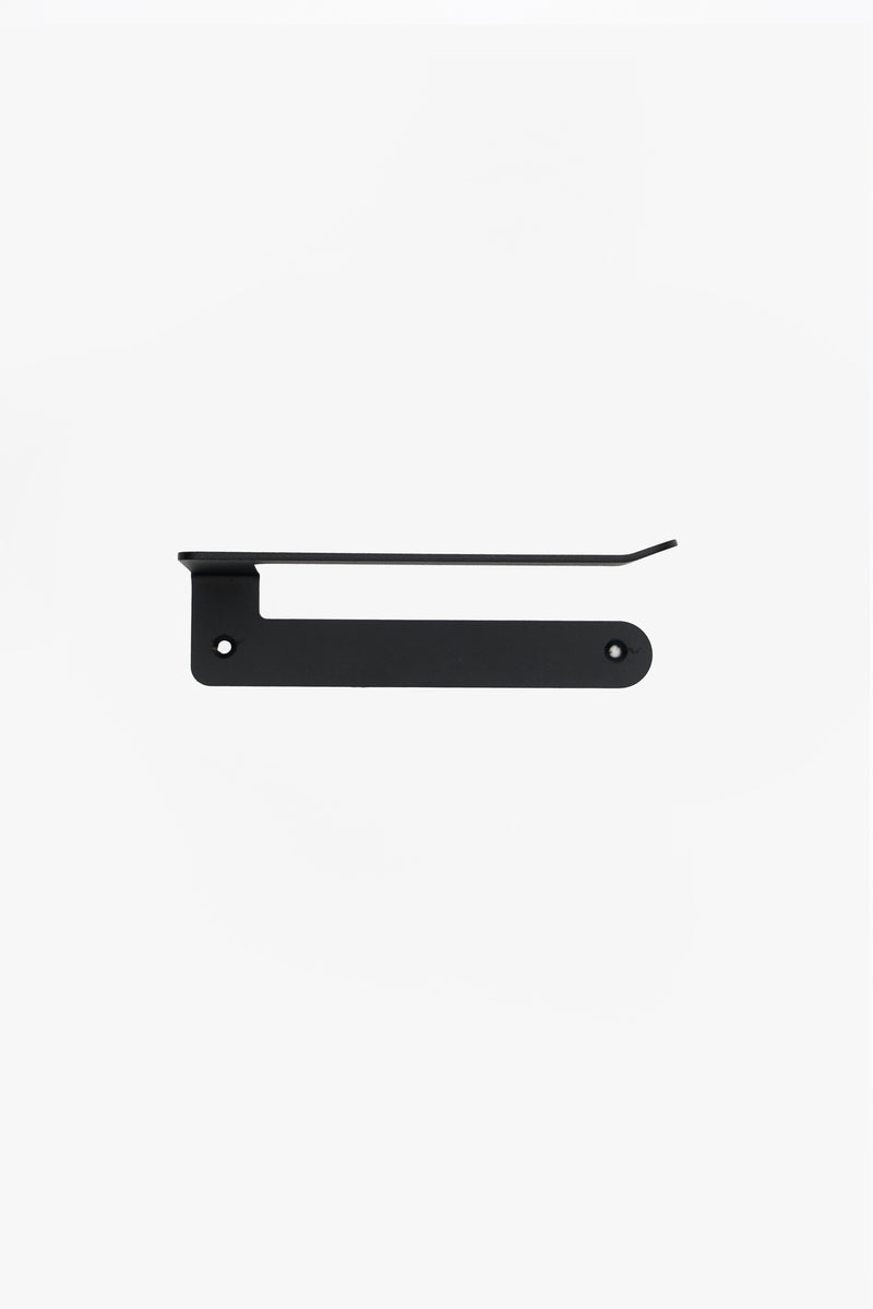 An ATYP powder coated steel holder photographed from the front in the studio