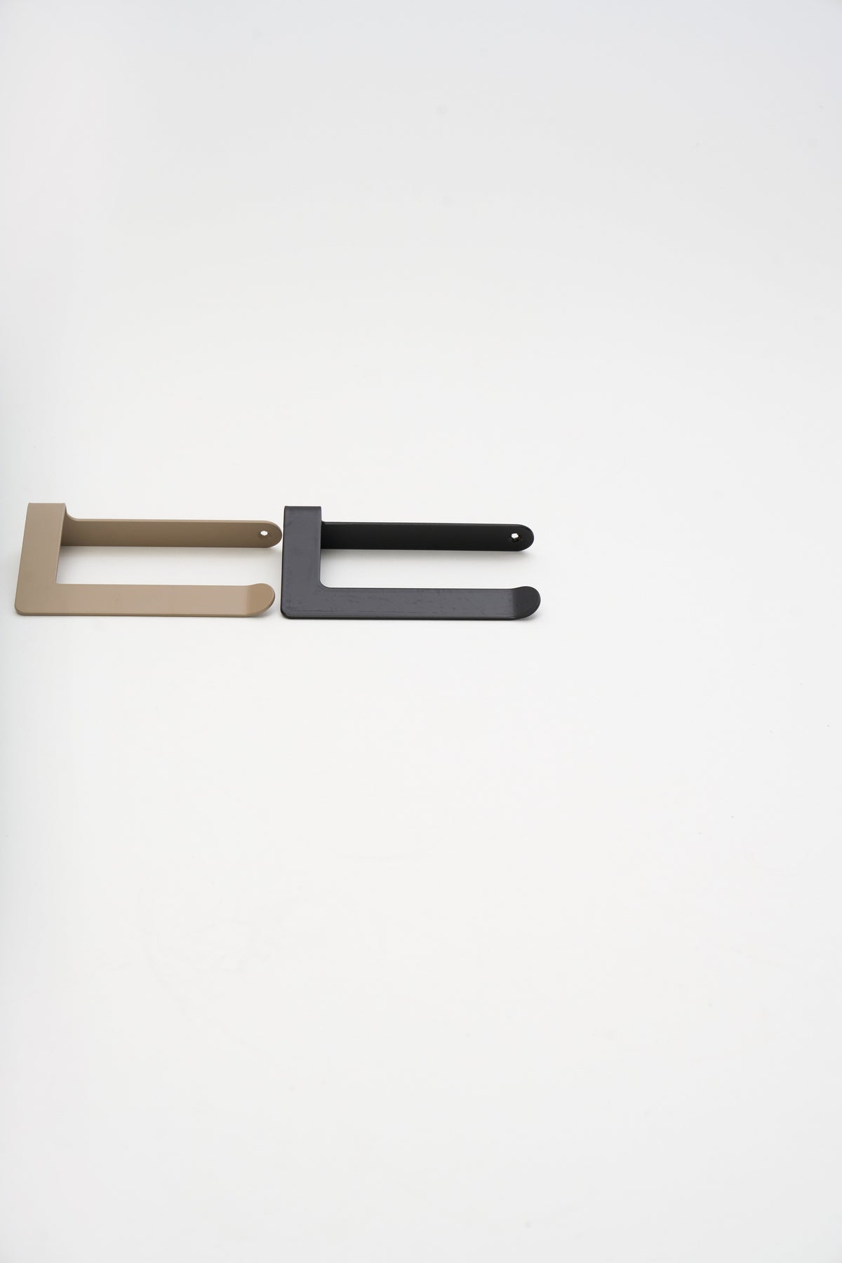 Finished ATYP steel pieces covered by the two-year guarantee, studio flat lay