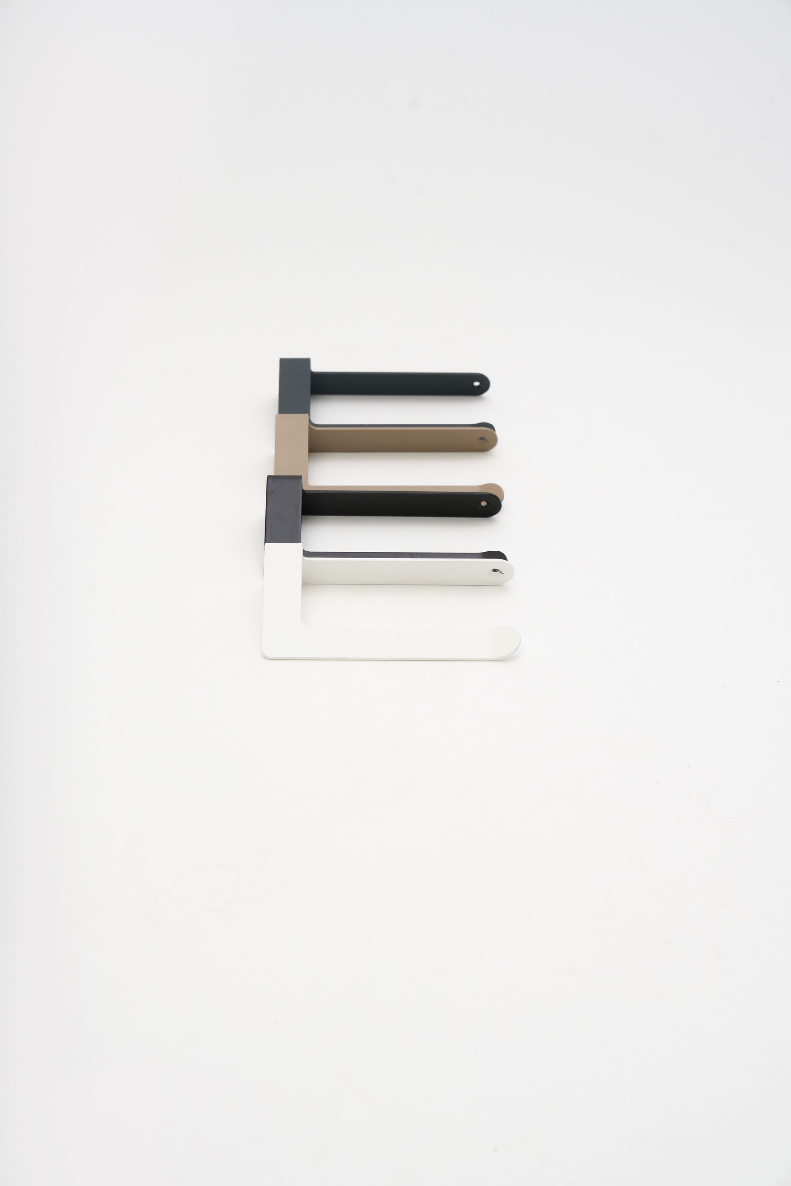 ATYP powder coated steel pieces laid out together in the studio