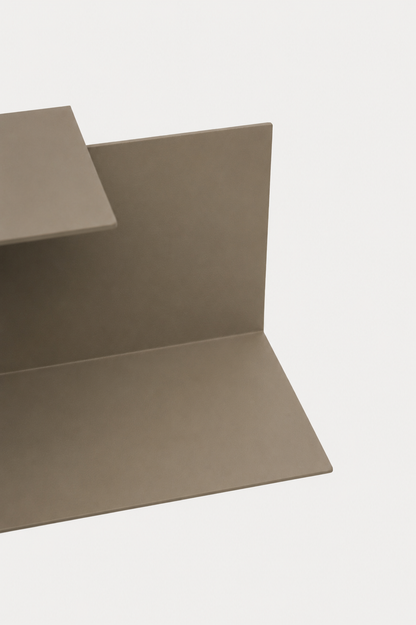 LYNX floating shelf in Linen powder coated steel, RAL 1019, close crop of the L profile, warm grey beige matte surface