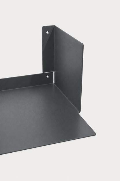 LUMO living room shelf in Slate powder coated steel, RAL 7016, corner close-up of the U profile, two mounting holes