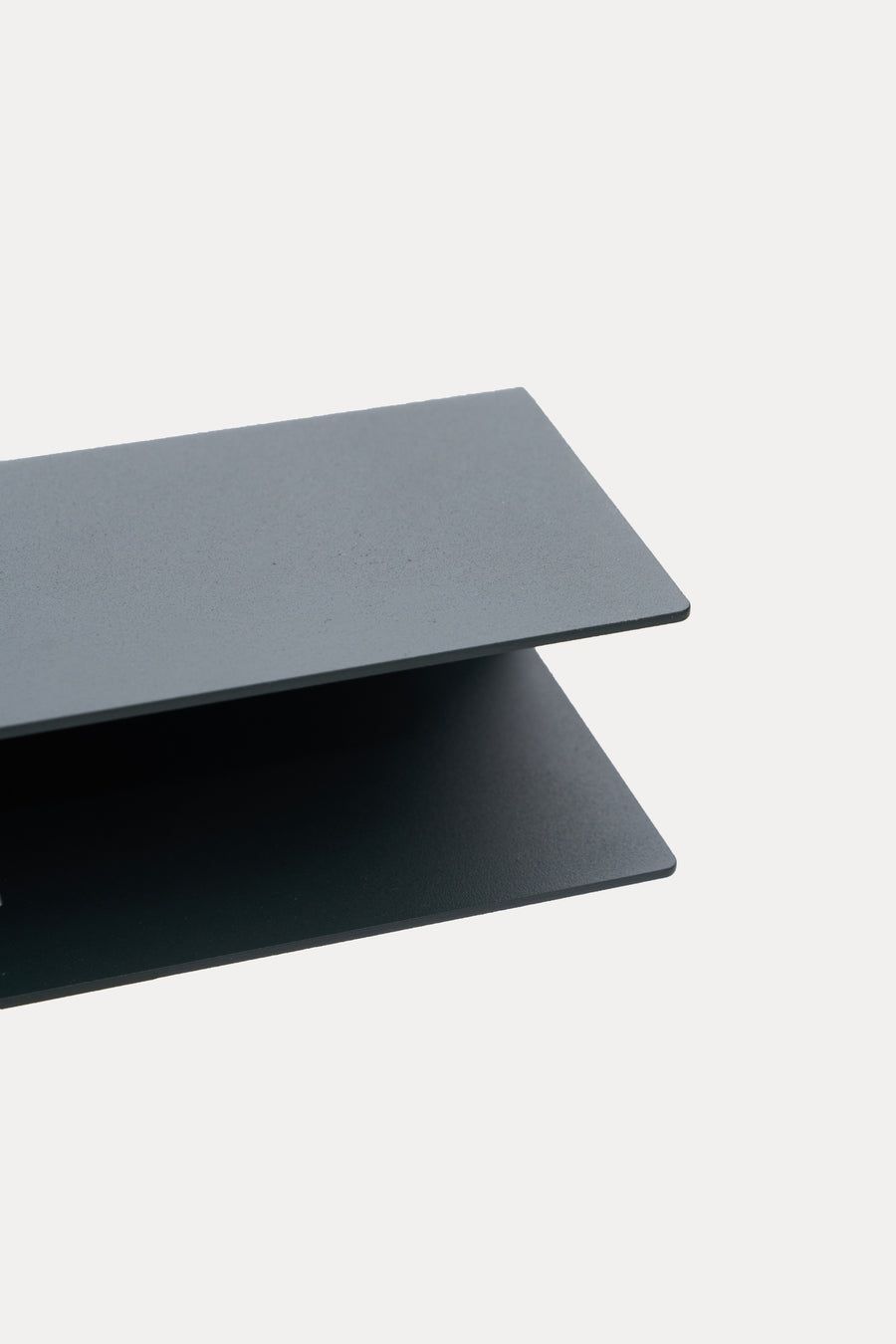 A finished ATYP piece in powder-coated steel, made to order in the workshop.