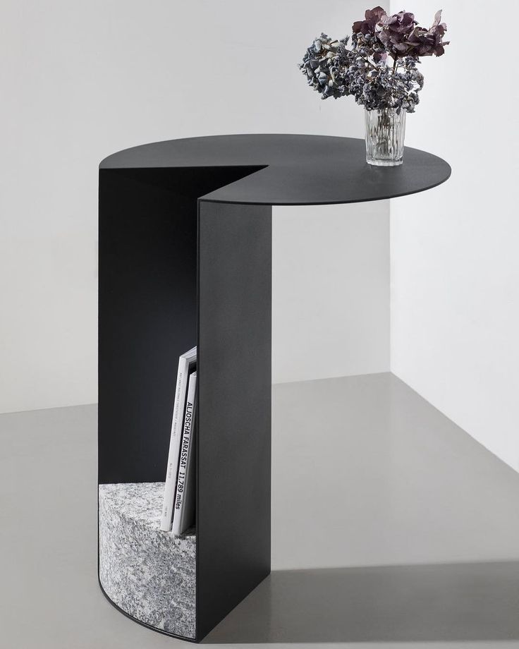 A student-designed steel piece styled in a finished interior, built in the ATYP workshop.