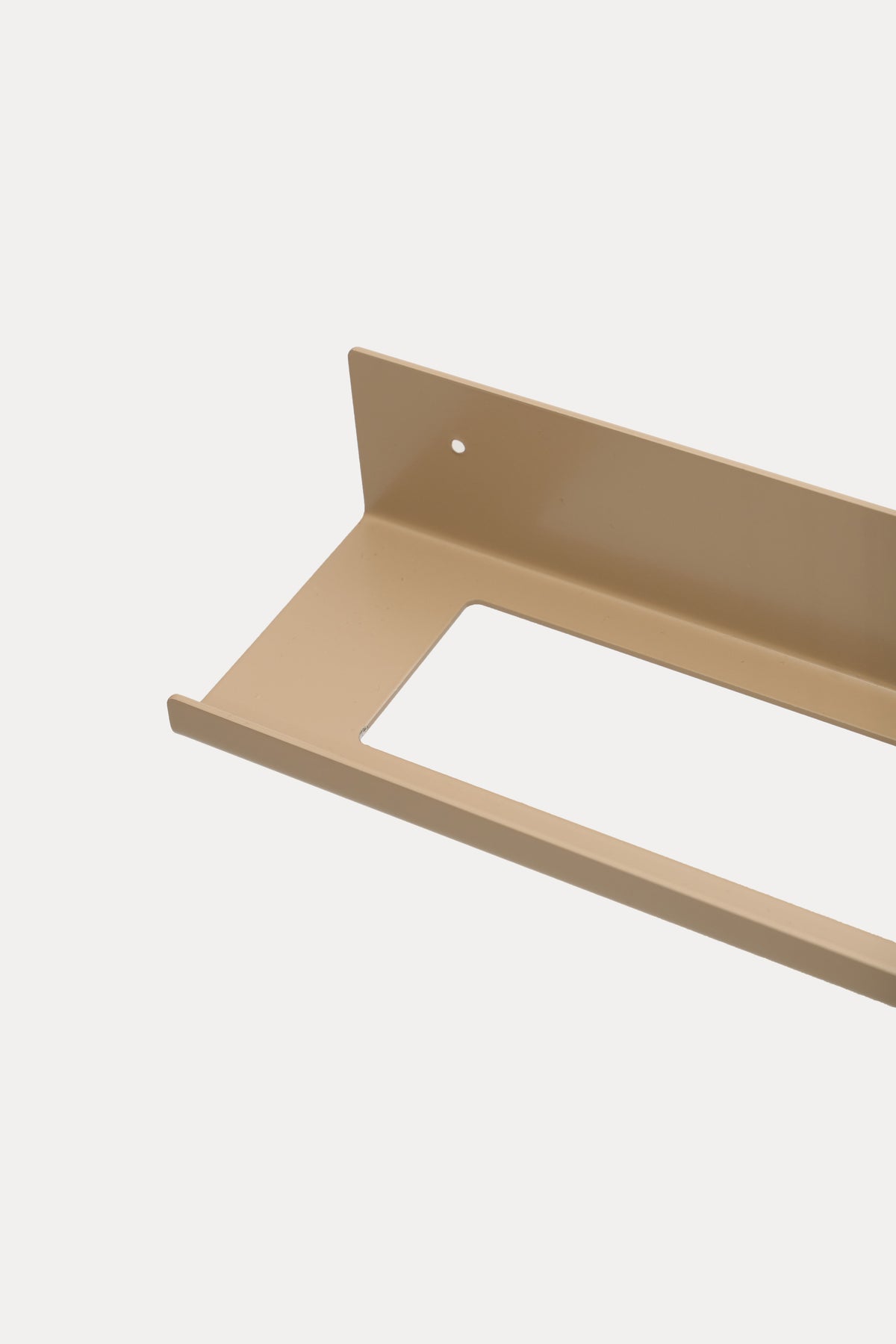 TUSCANY towel shelf in Linen powder coated steel, receding close-up along the shelf with towel opening, warm beige