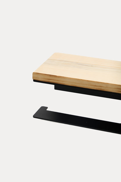 NYVE toilet paper holder in powder coated steel, pale ash wood top over the black steel holder and hook arm