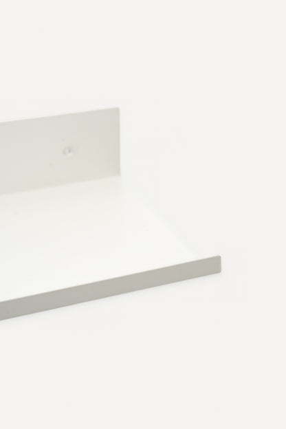 LUME bedroom shelf in Chalk powder coated steel, close-up of the ledge and front lip, bright white