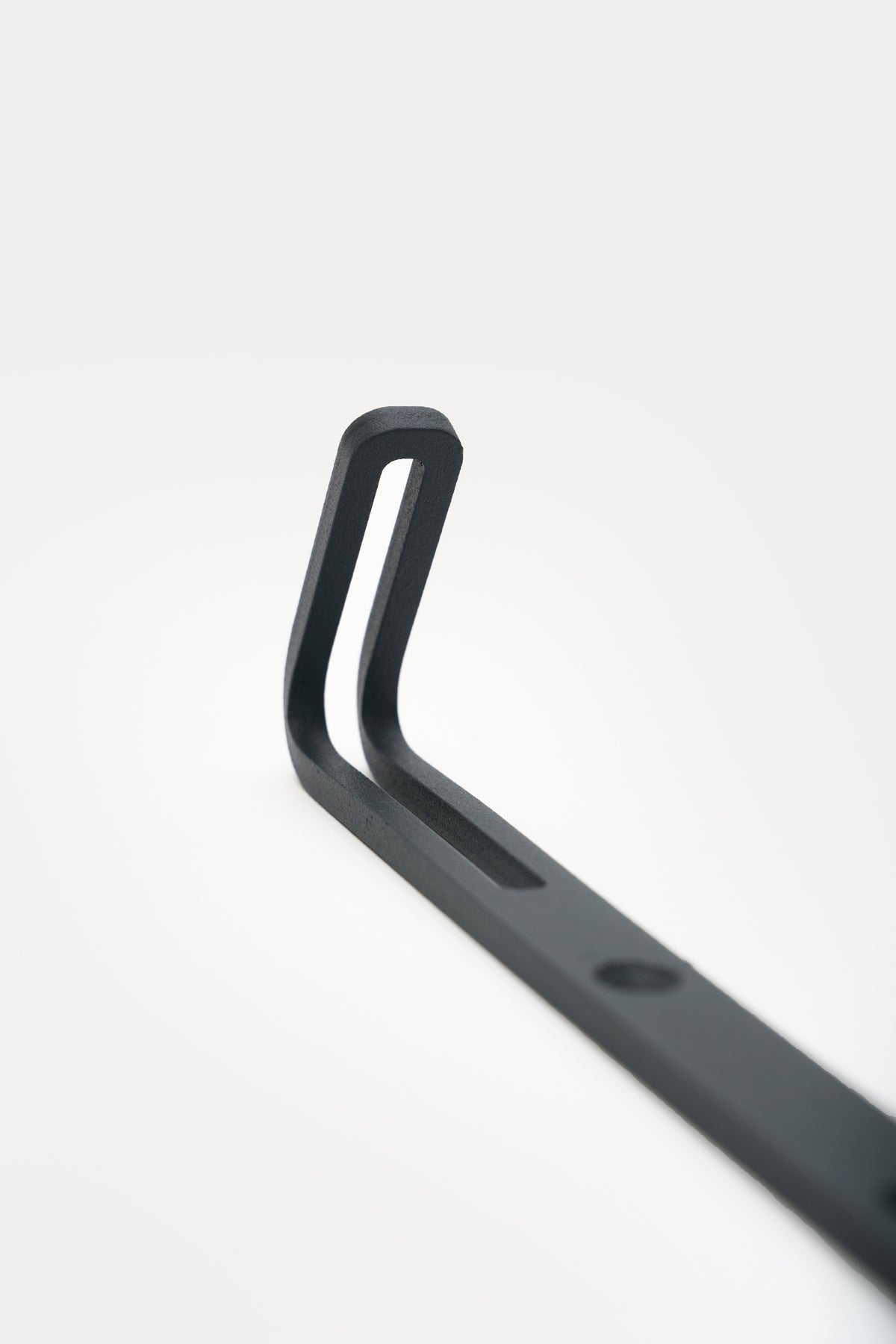 AIKI wall hook in Slate powder coated steel, anthracite grey, finish detail