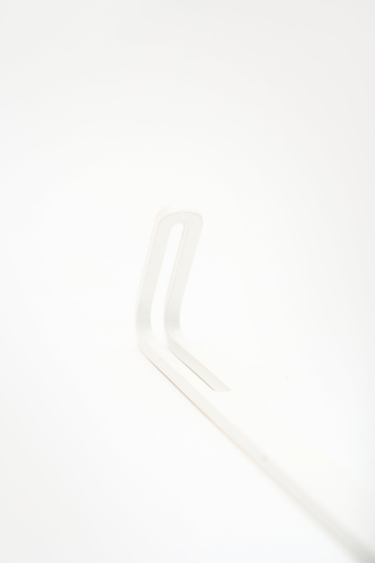 AIKI wall hook in Chalk powder coated steel, RAL 9016, soft white, detail view, made in Slovakia