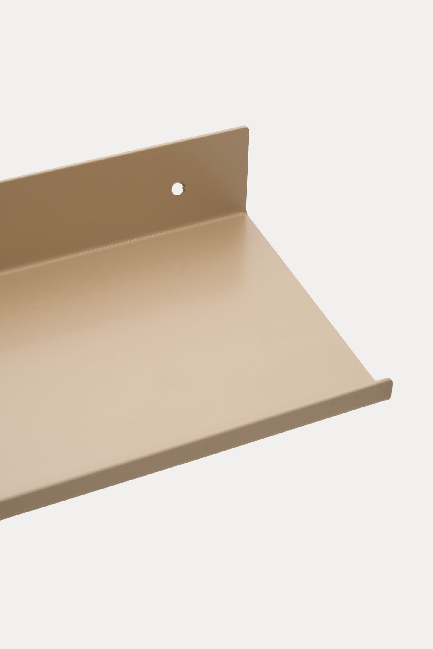 LUME bedroom shelf in Linen powder coated steel, close-up of the ledge and front lip, warm beige