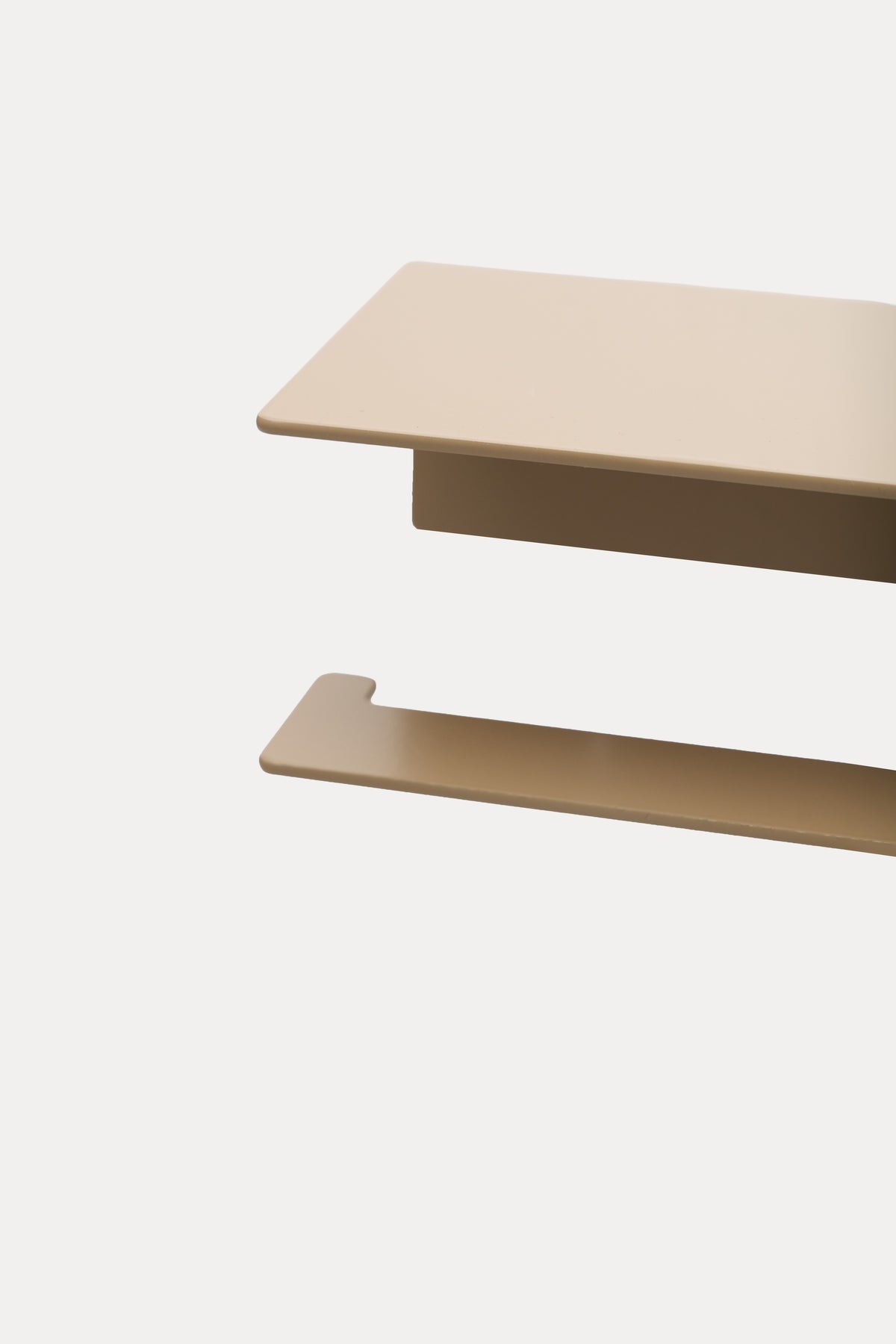 NYVE toilet paper holder in Linen powder coated steel, close-up of the top shelf and hook arm, warm beige
