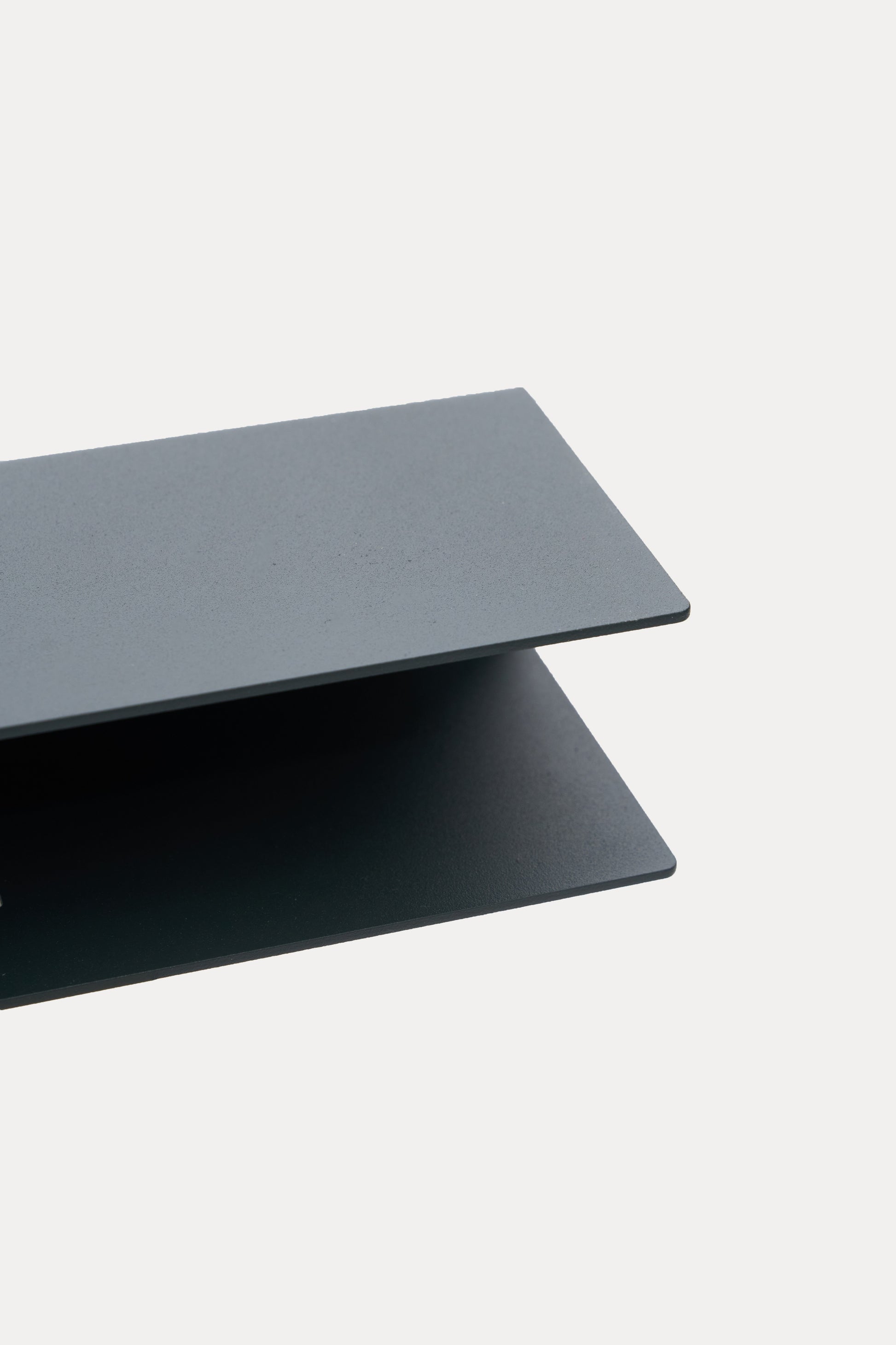 NYVE toilet paper holder in Slate powder coated steel, anthracite grey, finish detail