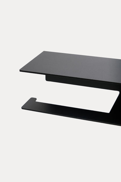 NYVE toilet paper holder in Graphite powder coated steel, jet black, close view of the surface