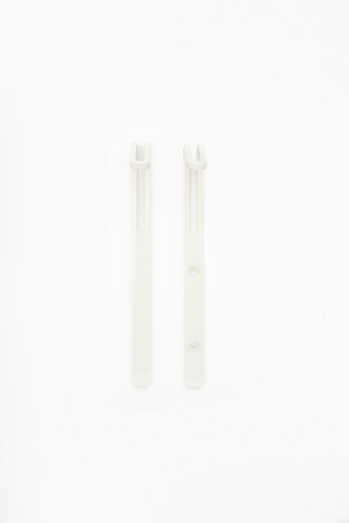 AIKI wall hook in Chalk powder coated steel, screw and tape versions side by side, soft white