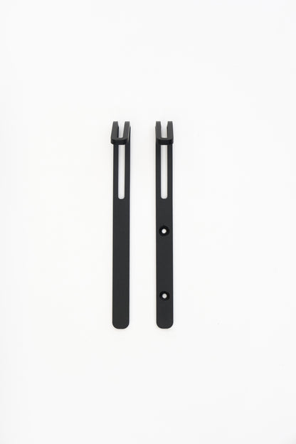 AIKI wall hook in powder coated steel, screw and tape versions side by side, matte black