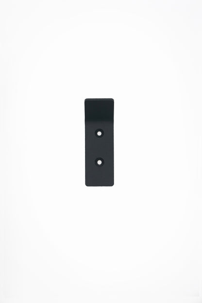 CORE wall hook in Slate powder coated steel, front view of the screw-mount hook, dark anthracite grey, two screw holes