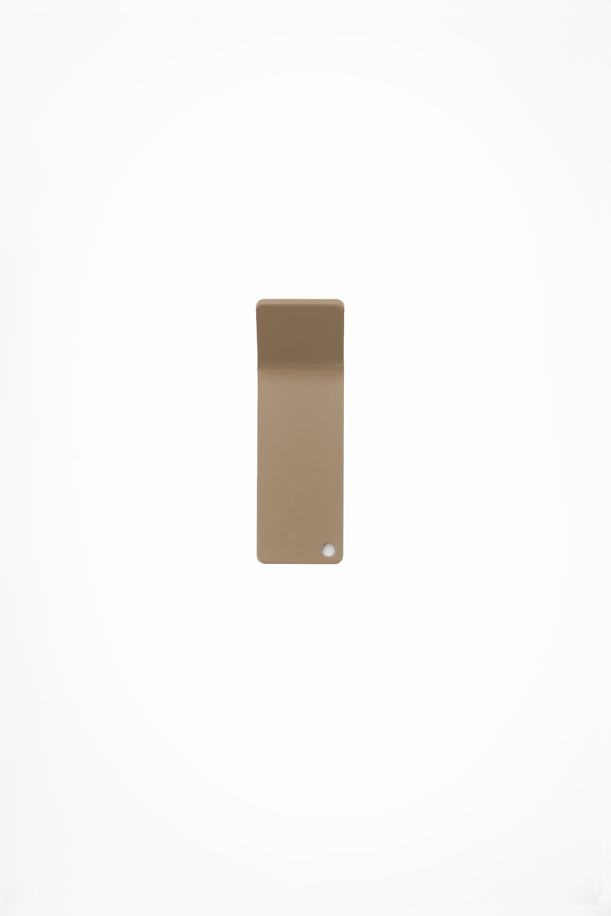 CORE wall hook in Linen powder coated steel, warm beige, photographed straight on