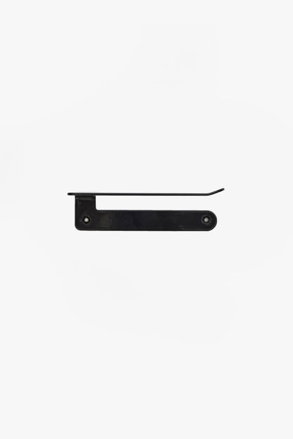 CLAIR toilet paper holder in powder coated steel, front view of the rounded plate and roll arm with a soft sheen, black